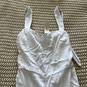 Francesca’s white jumpsuit
